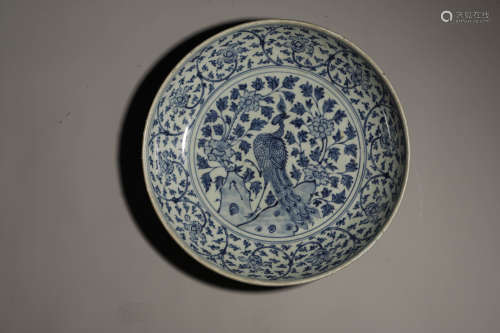 A BLUE AND WHITE PEACOCK FLOWER PLATE