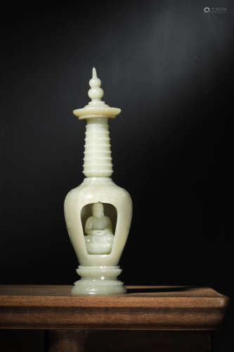 A PALE CELADON JADE STUPA