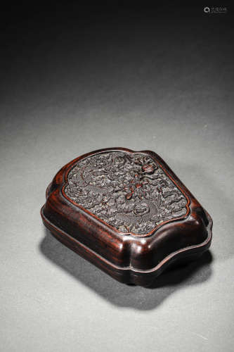 A RED SANDALWOOD CARVED DRAGON BOX AND COVER