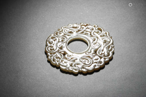 A KHOTAN JADE CARVED DRAGON BI DISC