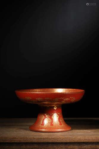 AN IRON-RED GLAZED GILT-DECORATED STEM-DISH, QIANLONG MARK