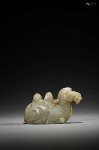 A KHOTAN WHITE JADE CAMEL ORNAMENT