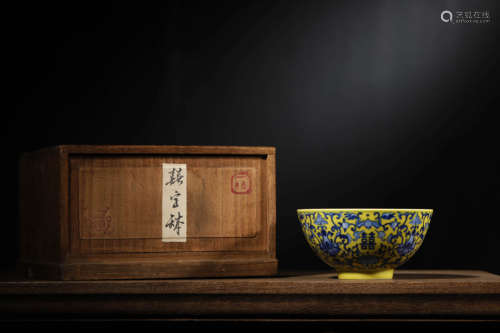 A YELLOW GLAZED BLUE ENAMELED 'FLOWER AND XI' BOWL, DAOGUANG...