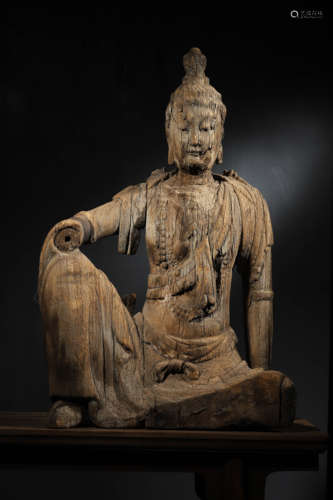 A WOOD CARVED ROYAL-EASE GUANYIN