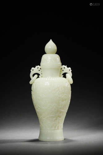 A KHOTAN WHOSE JADE INTERLOCKING FLORAL VASE