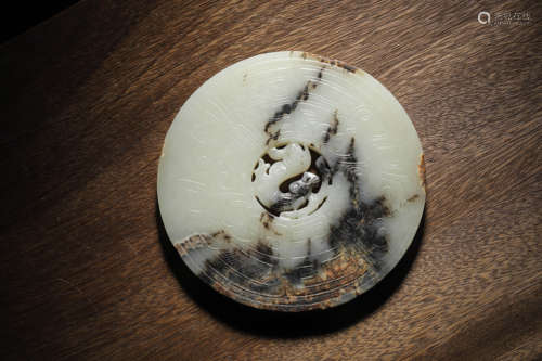 A WHITE AND RUSSET JADE DEER-PATTERN BI DISC