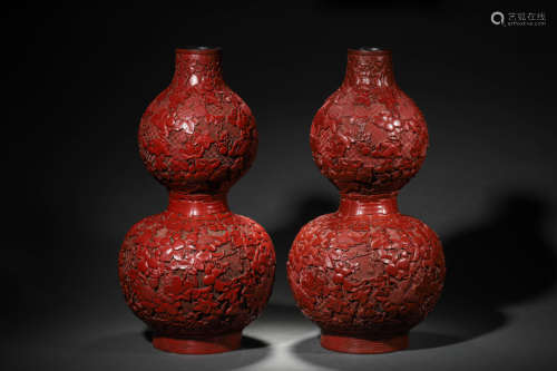 A PAIR OF CINNABAR LACQUER DOUBLE-GOURDS, QIANLONG MARK