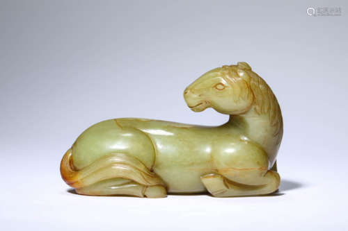 A Yellow Jade Recumbent Horse