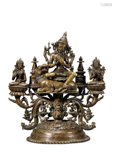 A Copper and Silver Inlaid Manjushri Statue