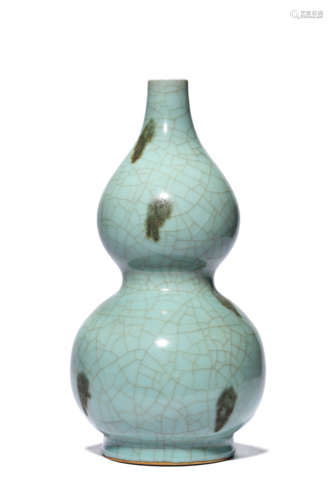 A Porcelain Celadon-Glazed Double-Gourd Vase