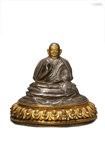 A Tibetan Gilt-Bronze Guru Statue