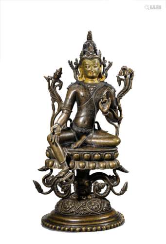 A Copper and Silver Inlaid Green Tara Statue