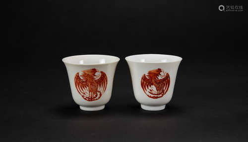 An Pair Of Iron-Red Phoenix Cups.