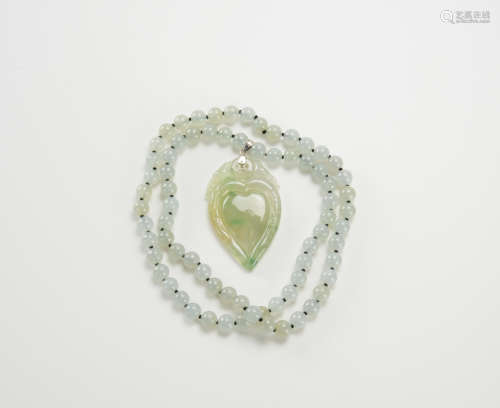 A Semi-Translucent Jadeite Beads Necklace And Jadeite Hartsh...