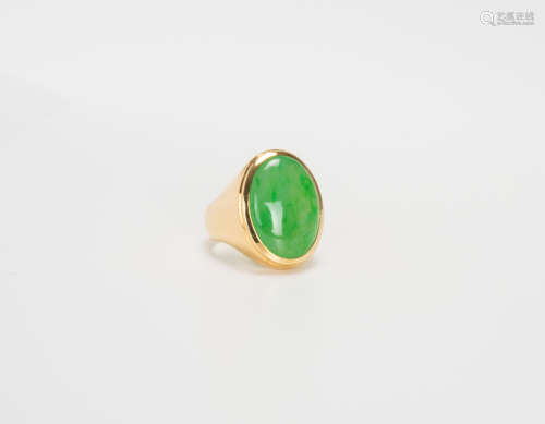 A Green Jadeite Mounted In 18K Gold Ring