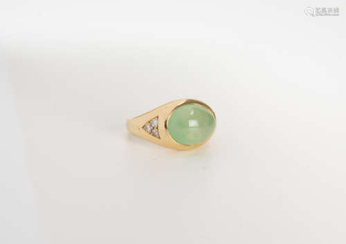 A Semi-Translucent Jadeite Ring With 14k Gold And Diamond