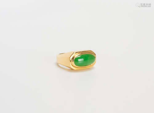 A Green Jadeite Mounted In 18K Gold Ring
