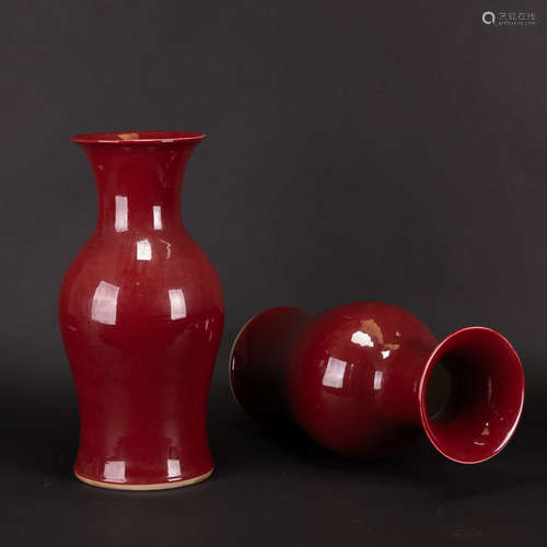 A PAIR OF RED GLAZED VASES