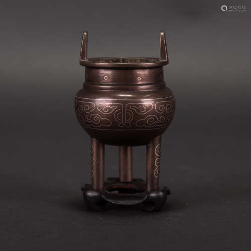 A CARVED BRONZE TRIPOD CENSER WITH BASE