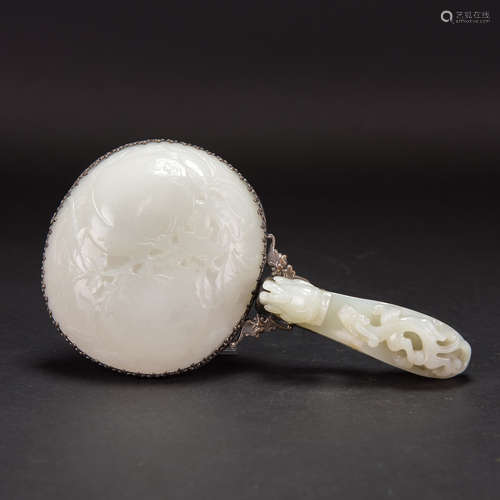 A CARVED WHITE JADE MOUNTED SILVER HAND MIRROR