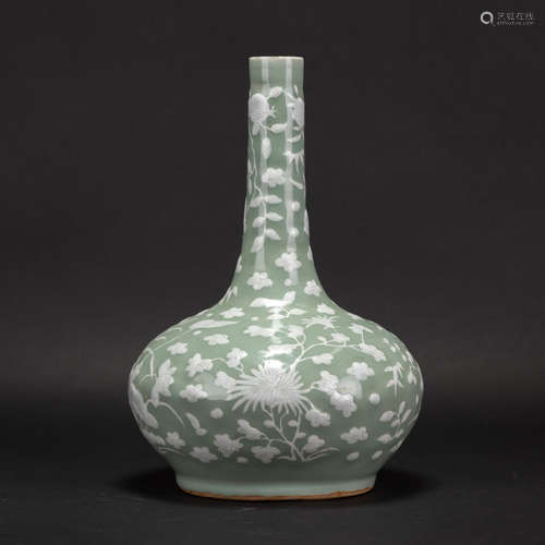 A CELADON GLAZED VASE WITH WHITE SLIP DECORATION, 18TH CENTU...