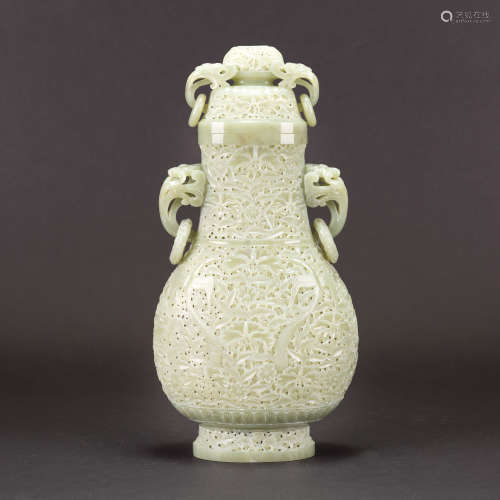 A CARVED CELADON WHITE JADE VASE AND COVER, MID-20TH CENTURY