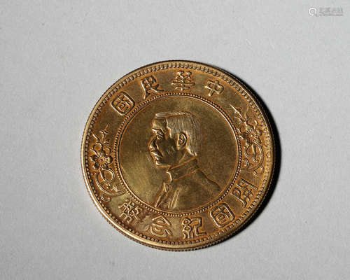 A figure patterned gold coin,the Republic of China