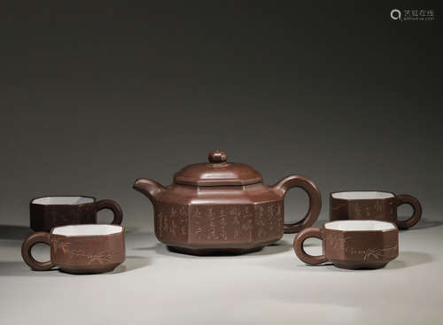 A set of inscribed zisha clay teapot and cups,Gu Jingzhou ma...