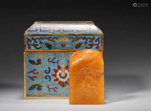 A carved tianhuang Shoushan soapstone seal with a cloisonne ...