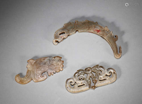 A group of dragon and phoenix shaped jade pendants,Han Dynas...