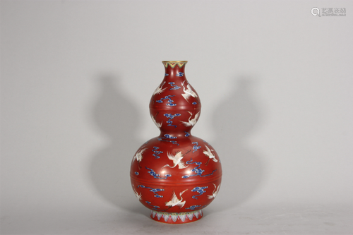 A famille rose cloud and crane porcelain gourd shaped vase,Q...