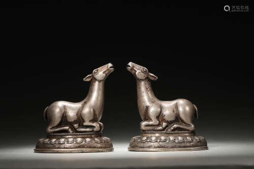 A pair of Tibetan silver deer ornaments