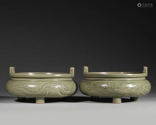 A pair of dragon and phoenix patterned Yaozhou kiln porcelai...