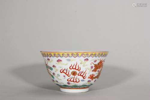 A dragon and phoenix patterned famille rose porcelain bowl,Q...