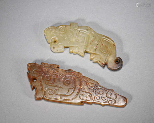 A pair of beast patterned jade pendants,Han Dynasty,China