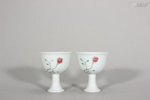 A pair of underglaze red multicolored flower porcelain cups,...