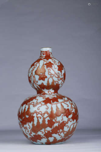 A Celadon-Ground Iron-Decorated Double-Gourd Vase