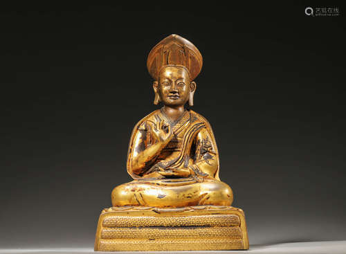 A Gilt-Bronze Figure Of Buddha