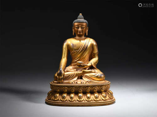 A Gilt-Bronze Figure Of Sakyamuni