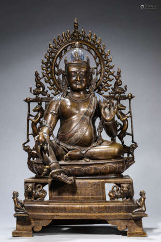 A Tibetan Silver Inlaid Yellow  Jambhala Statue