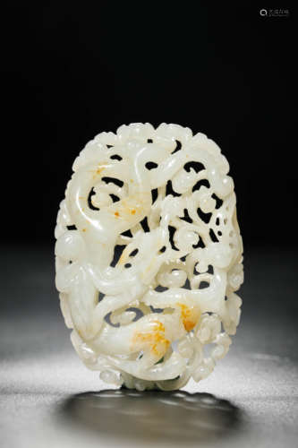 A Jade Openwork Dragon Pendant