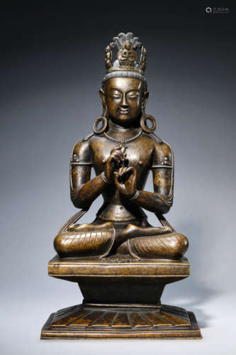 A Tibetan Copper and Silver Inlaid Mahavairocana Statue