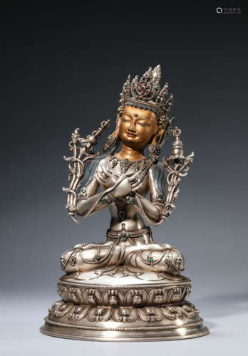 A Tibetan Silver Vajardhar Statue