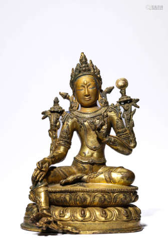 A Gilt-Bronze Green Tara Statue