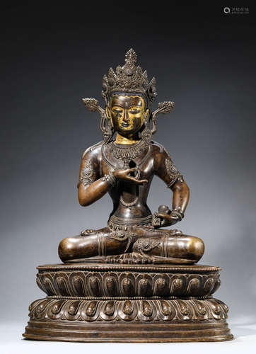 A Tibetan Copper and Silver Inlaid Vajrasattva Statue