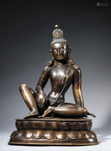 A Tibetan Copper and Silver Inlaid Avalokiteshvara Statue