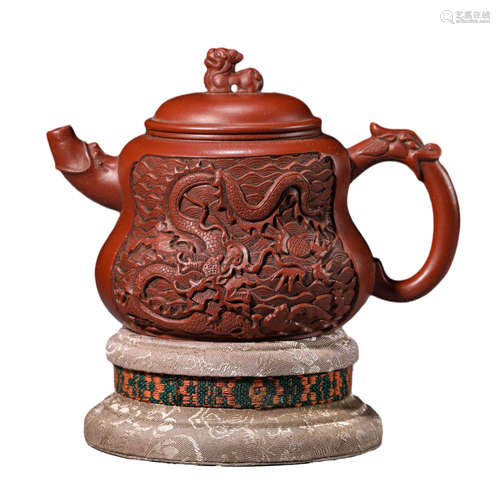 A Molded Cinnabar Dragon Teapot