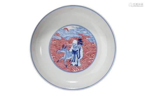 An Iron-Red-Decorated Blue And White Figural Dish