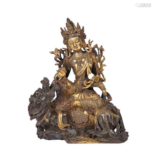 A Gilt-Bronze Figure Of Manjushri