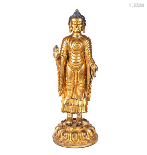 A Gilt-Bronze Figure Of Buddha